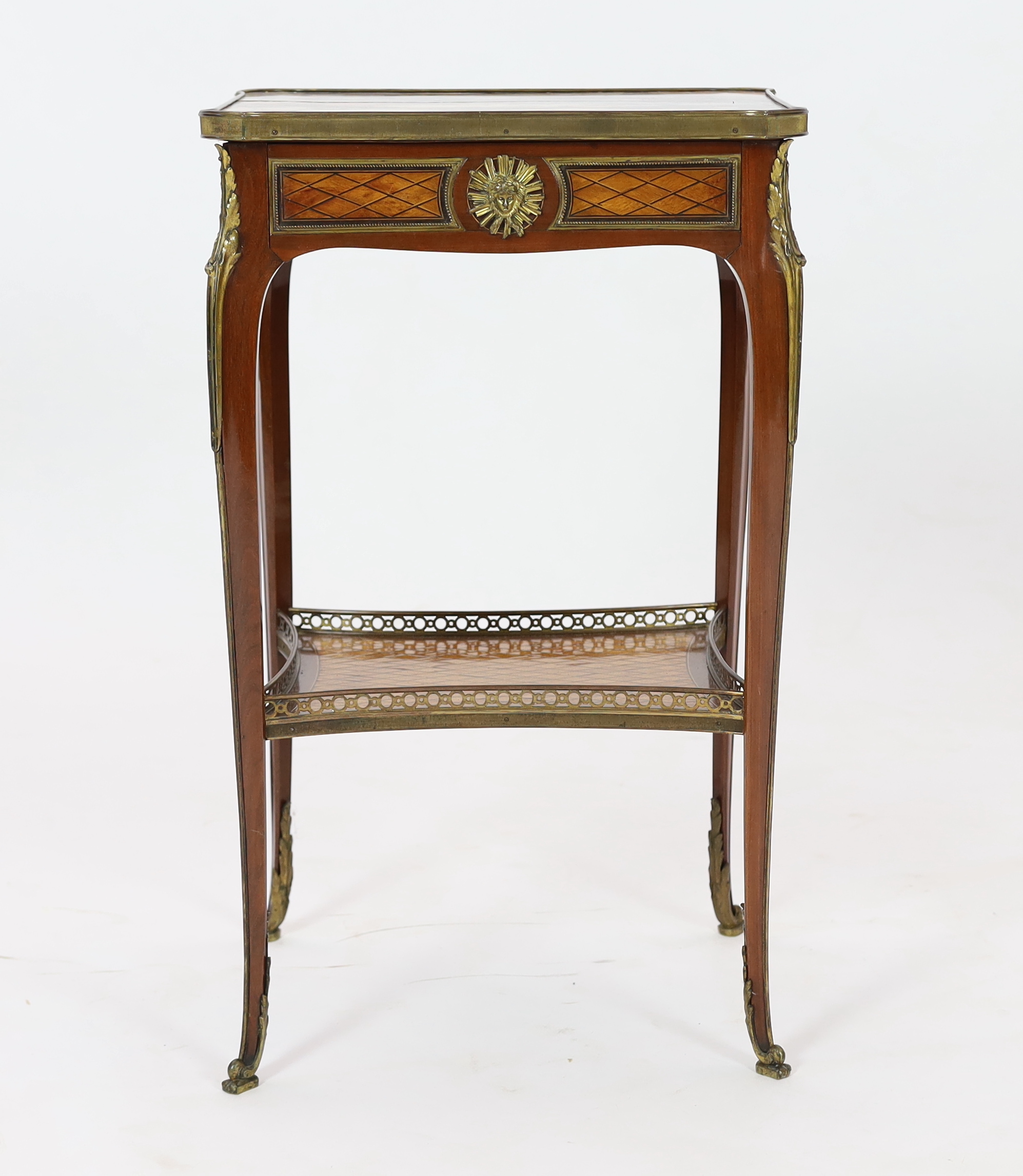 A Louis XV style ormolu-mounted and satinwood parquetry inlaid mahogany gueridon, 43cm wide, 33cm deep, 73cm high, Please note this lot attracts an additional import tax of 5% on the hammer price